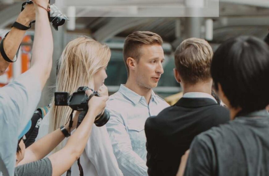 People being interviewed and filmed.